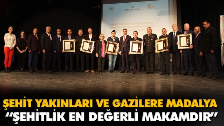 ŞEHİT YAKINLARI VE GAZİLERE MADALYA