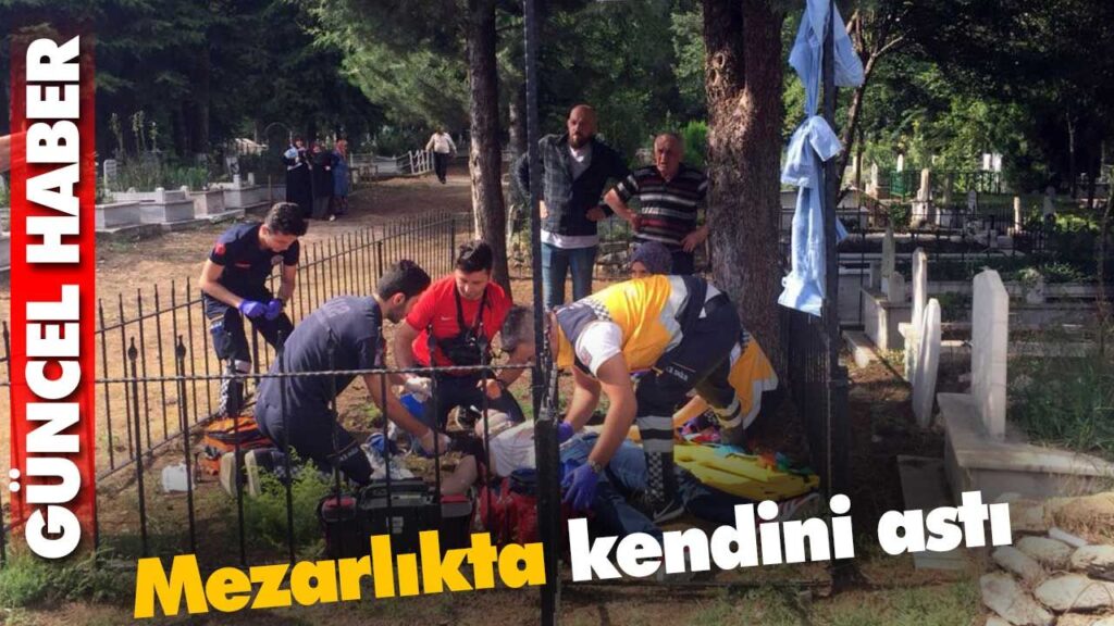 Mezarlıkta kendini astı Mezarlıkta kendini astı