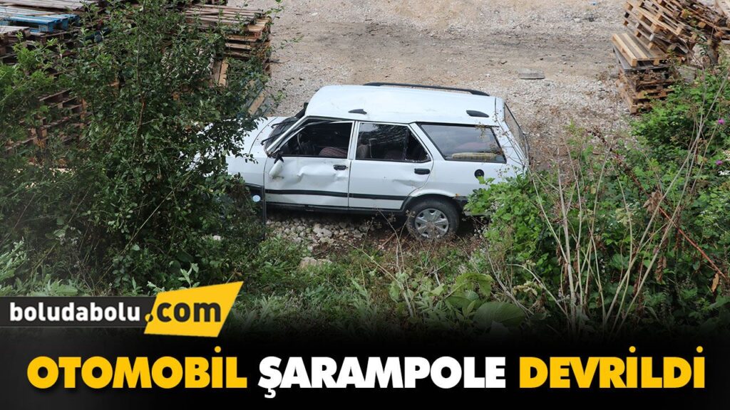OTOMOBİL ŞARAMPOLE DEVRİLDİ