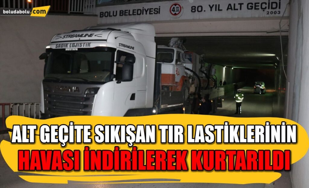 Bolu’da alt geçide sıkışan tır lastiklerinin havası indirilerek kurtarıldı