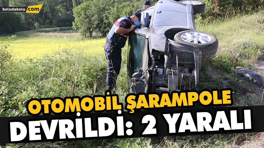 OTOMOBİL ŞARAMPOLE DEVRİLDİ: 2 YARALI OTOMOBİL ŞARAMPOLE DEVRİLDİ: 2 YARALI