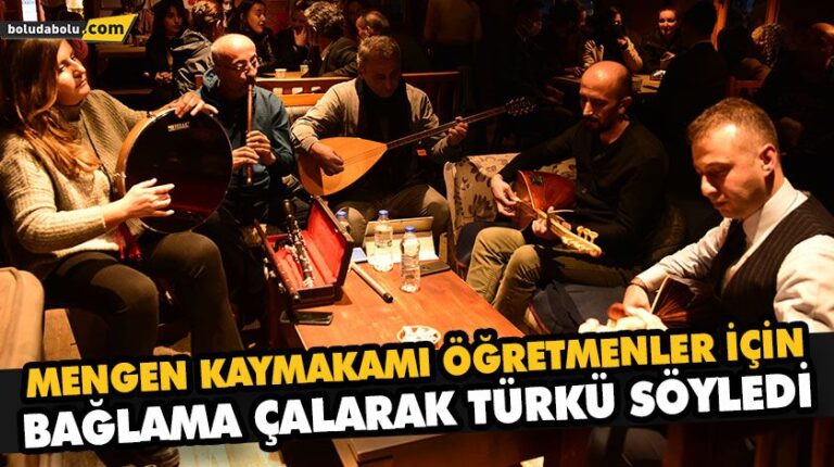 MENGEN KAYMAKAMI ÖĞRETMENLER İÇİN BAĞLAMA ÇALARAK TÜRKÜ SÖYLEDİ
