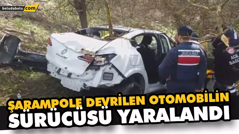ŞARAMPOLE DEVRİLEN OTOMOBİLİN SÜRÜCÜSÜ YARALANDI ŞARAMPOLE DEVRİLEN OTOMOBİLİN SÜRÜCÜSÜ YARALANDI