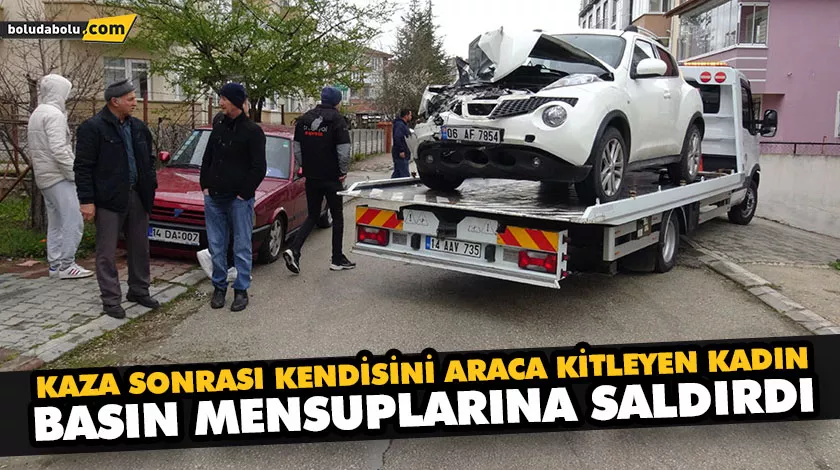 KAZA SONRASI KENDİSİNİ ARACA KİTLEYEN KADIN, BASIN MENSUPLARINA SALDIRDI KAZA SONRASI KENDİSİNİ ARACA KİTLEYEN KADIN, BASIN MENSUPLARINA SALDIRDI