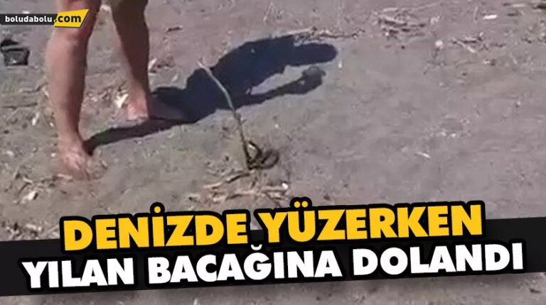 DENİZDE YÜZERKEN YILAN BACAĞINA DOLANDI