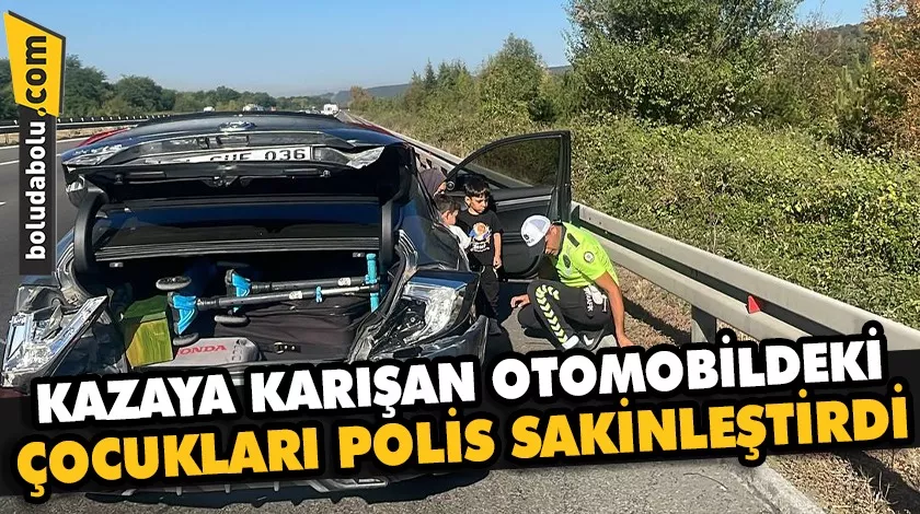 Düzce’de kazaya karışan otomobildeki çocukları polis sakinleştirdi Düzce’de kazaya karışan otomobildeki çocukları polis sakinleştirdi