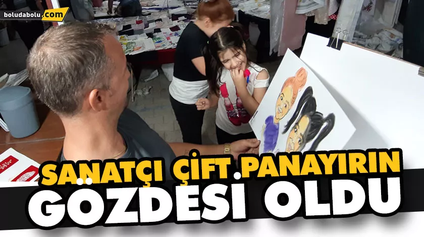 Sanatçı çift panayırın gözdesi oldu Sanatçı çift panayırın gözdesi oldu