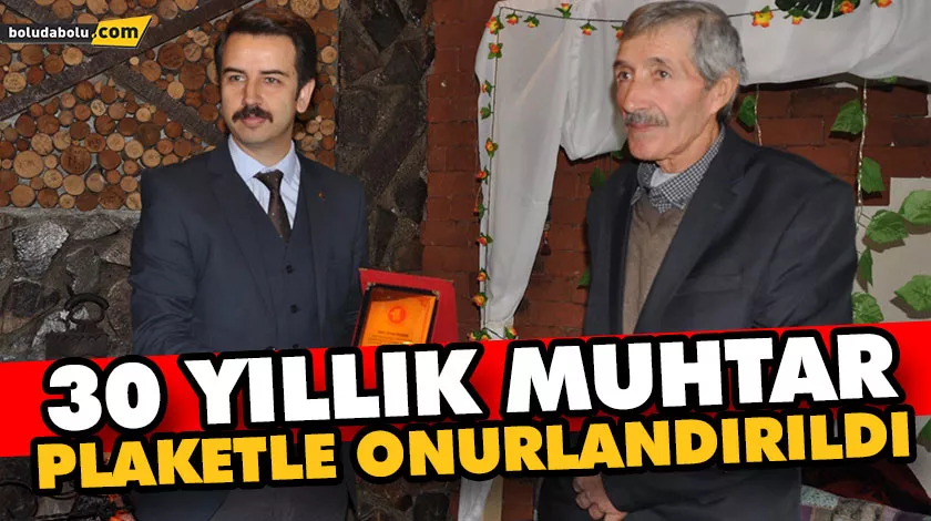 30 yıllık muhtar plaketle onurlandırıldı