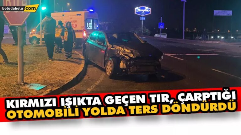 Kırmızı ışıkta geçen tır, çarptığı otomobili yolda ters döndürdü