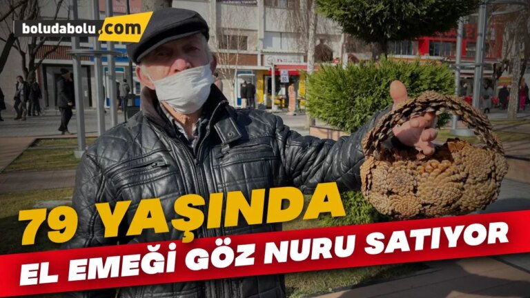 79 yaşında, elleriyle ördüğü kozalak sepetlerini sokaklarda satıyor