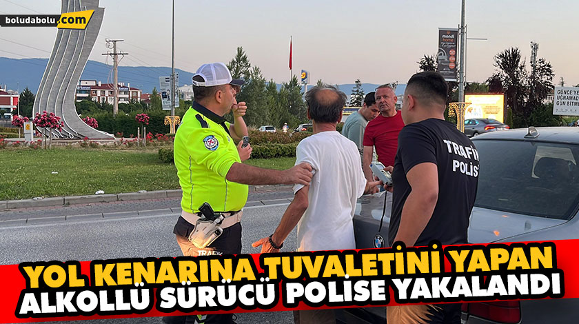 YOL KENARINA TUVALETİNİ YAPAN ALKOLLÜ SÜRÜCÜ POLİSE YAKALANDI YOL KENARINA TUVALETİNİ YAPAN ALKOLLÜ SÜRÜCÜ POLİSE YAKALANDI