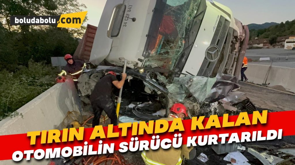 Tırın altında kalan otomobilin sürücüsü kurtarıldı Tırın altında kalan otomobilin sürücüsü kurtarıldı